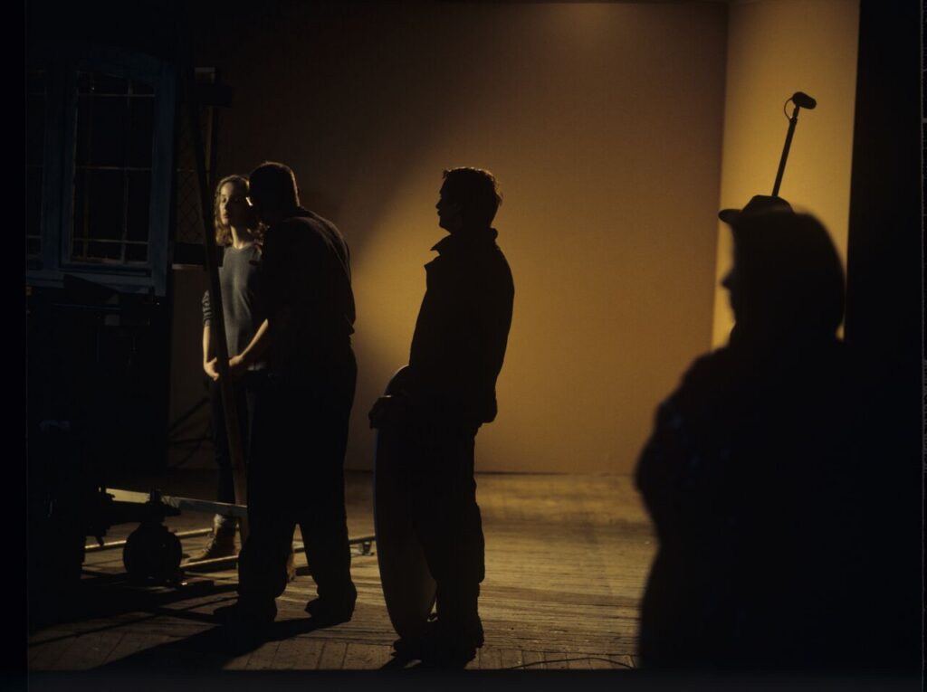 A set in a film studio, where a mock prison window was built.