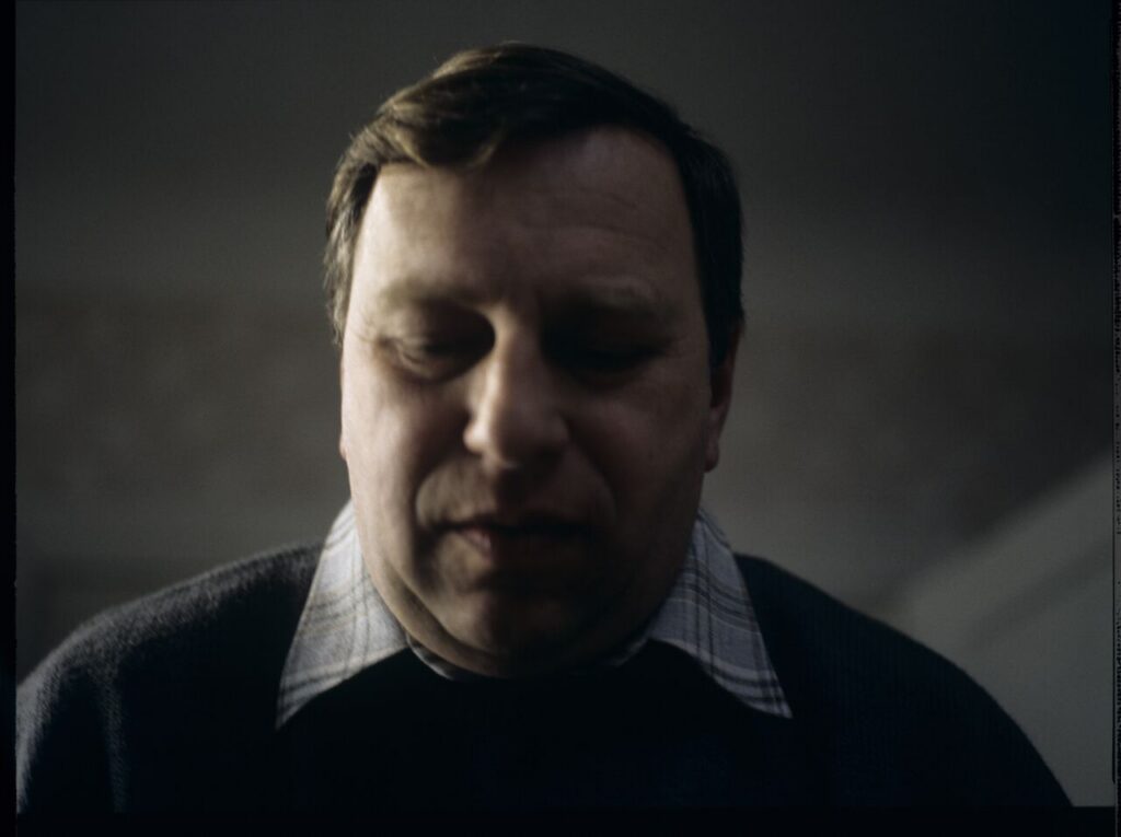 Jurek, Karol's brother (Jerzy Stuhr).