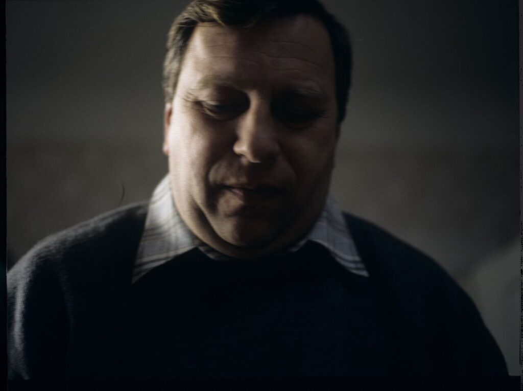 Jurek, Karol's brother (Jerzy Stuhr).