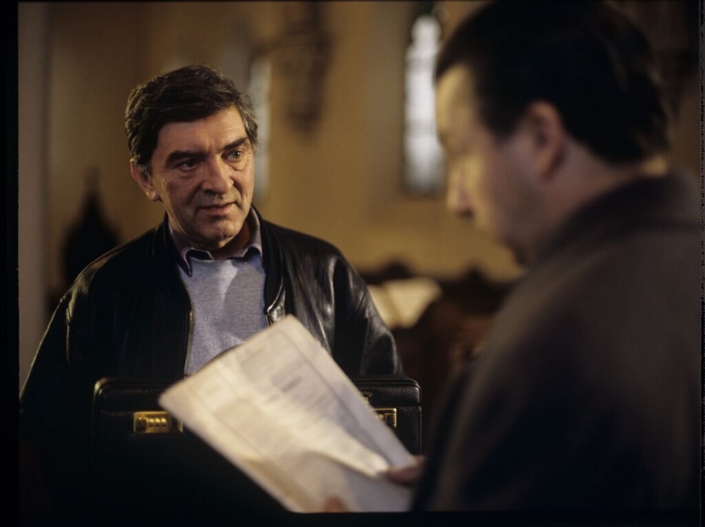 Mr. Bronek (Jerzy Trela), a driver and trusted man for special tasks.