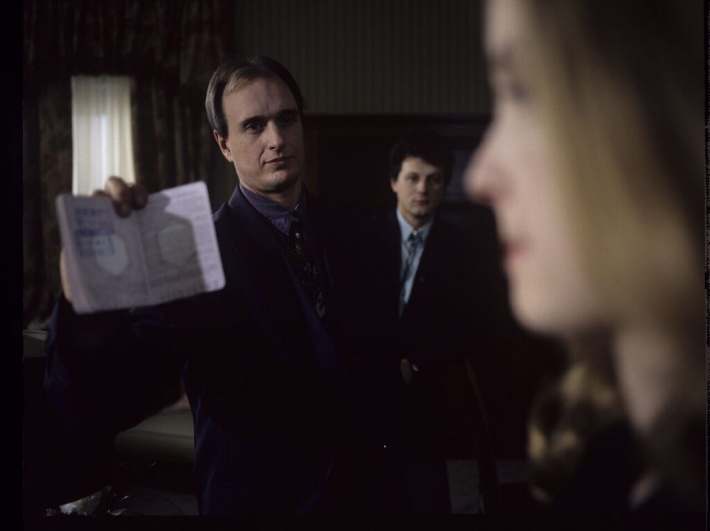 Dominique (Julie Delpy) in the scene where she is arrested by the police on suspicion of murdering her husband.