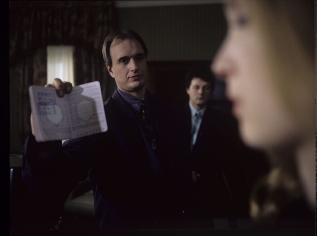 Dominique (Julie Delpy) in the scene where she is arrested by the police on suspicion of murdering her husband.