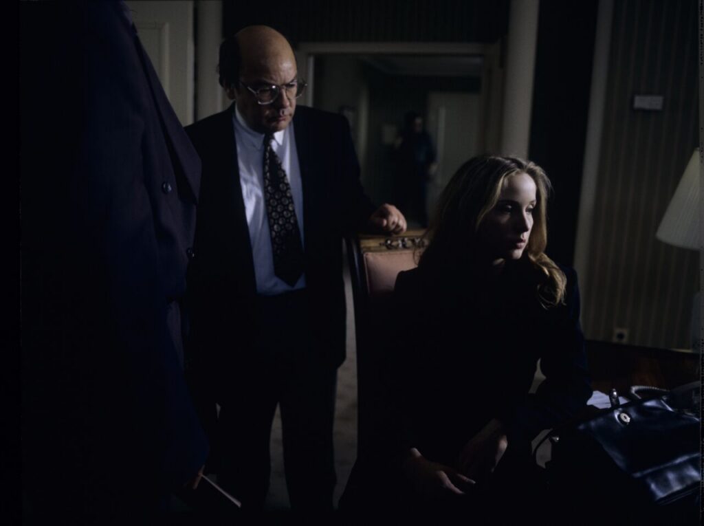 Dominique (Julie Delpy) in the scene where she is arrested by the police on suspicion of murdering her husband.