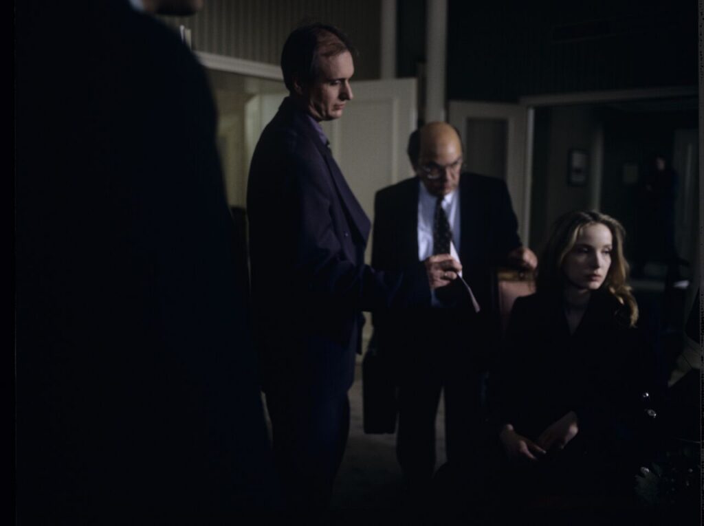 Dominique (Julie Delpy) in the scene where she is arrested by the police on suspicion of murdering her husband.