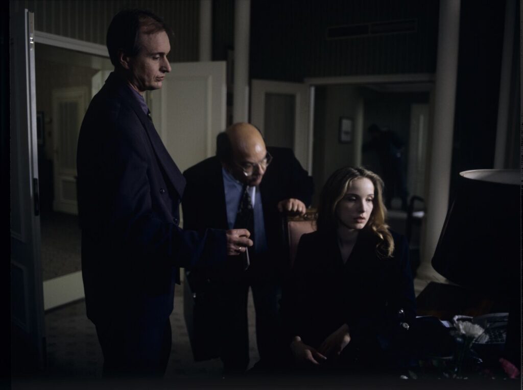 Dominique (Julie Delpy) in the scene where she is arrested by the police on suspicion of murdering her husband.