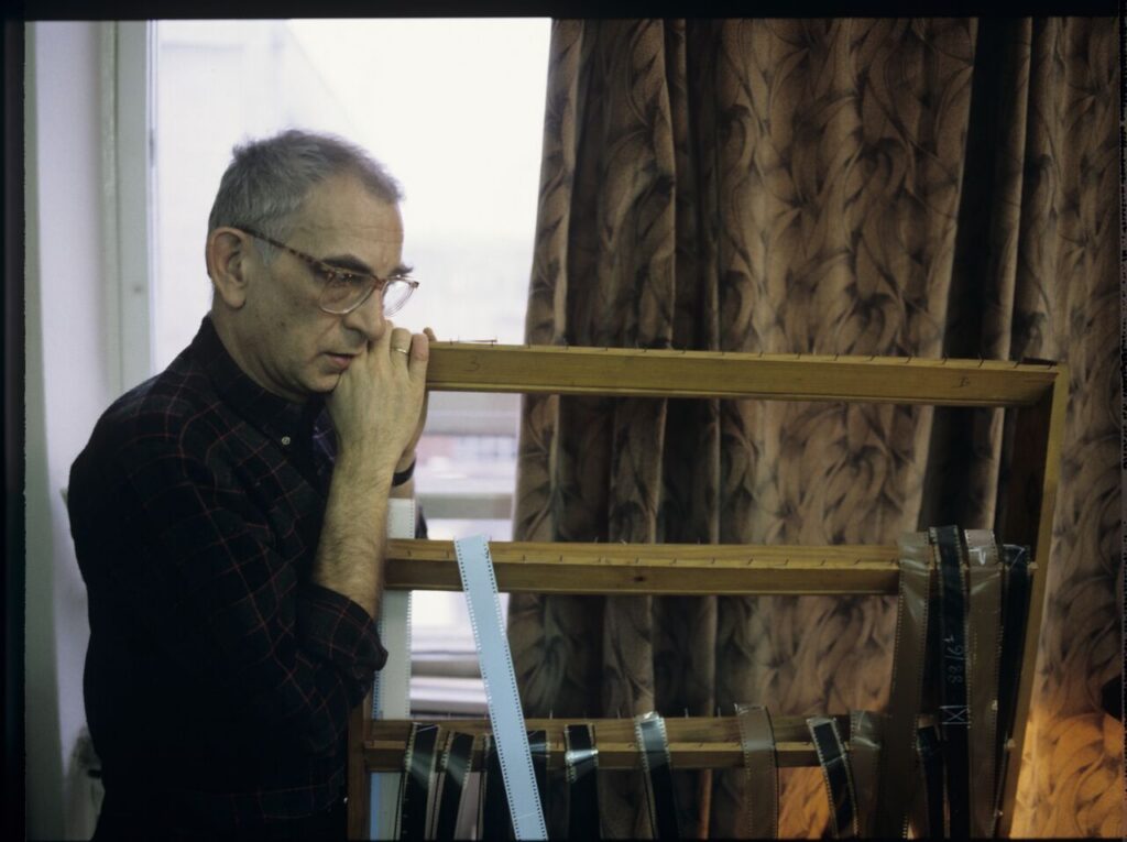 Krzysztof Kieślowski (director) in the editing room.