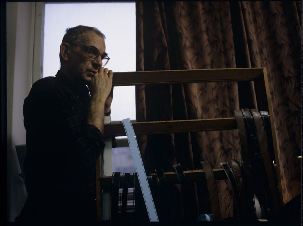 Krzysztof Kieślowski (director) in the editing room.