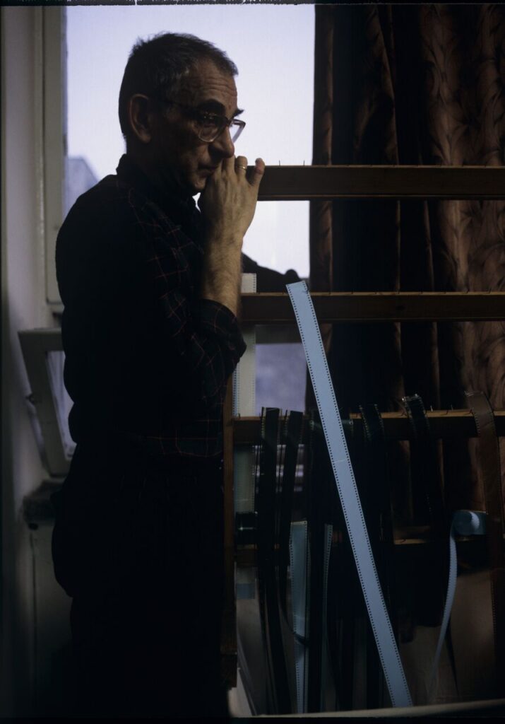 Krzysztof Kieślowski (director) in the editing room.