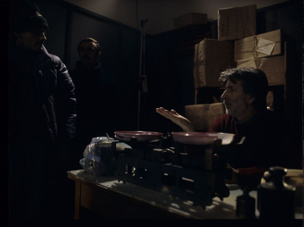 Edward Kłosiński (cinematographer) surrounded by the crew while working on the set.