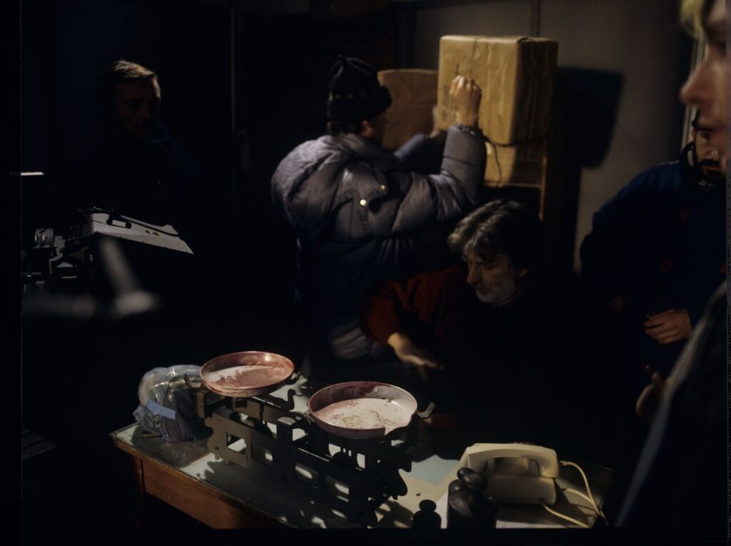 Edward Kłosiński (cinematographer) surrounded by the crew while working on the set.