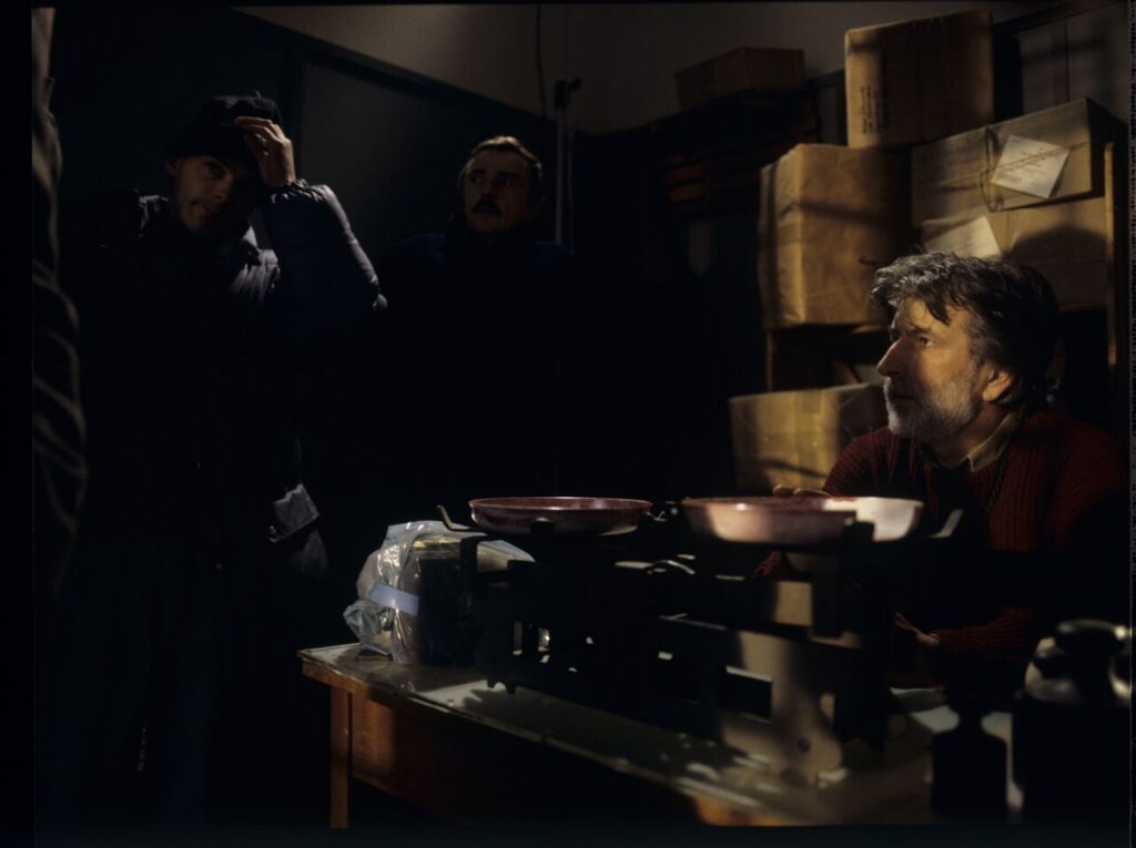 Edward Kłosiński (cinematographer) surrounded by the crew while working on the set.