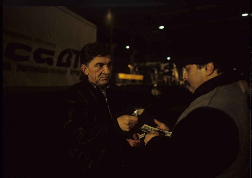 Mr. Bronek (Jerzy Trela) finalizes the deal of smuggling the deceased to fake the death of Karol.