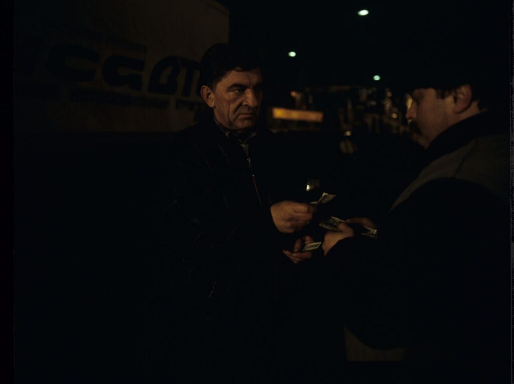 Mr. Bronek (Jerzy Trela) finalizes the deal of smuggling the deceased to fake the death of Karol.