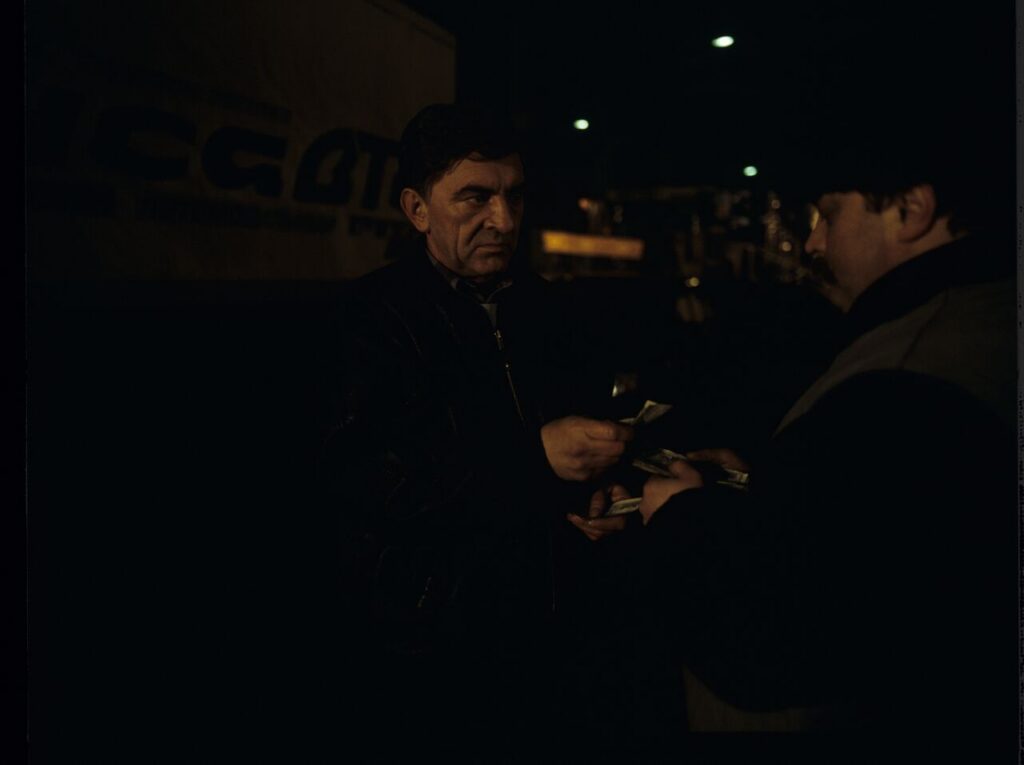 Mr. Bronek (Jerzy Trela) finalizes the deal of smuggling the deceased to fake the death of Karol.