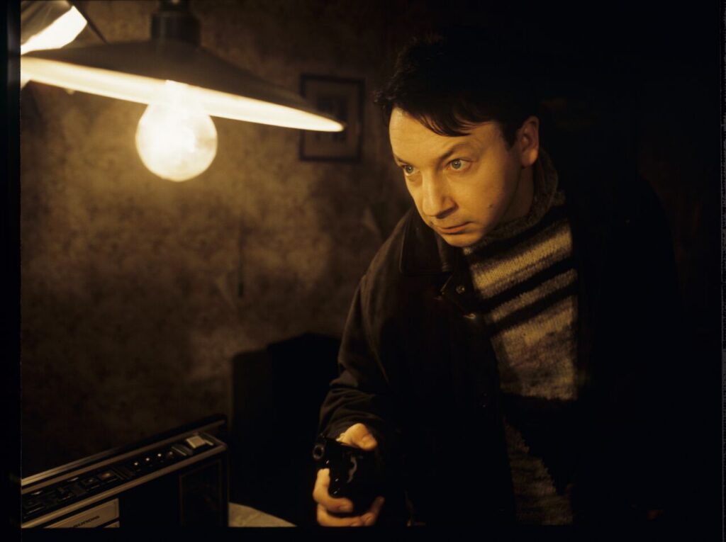 Karol (Zbigniew Zamachowski) as a bodyguard.