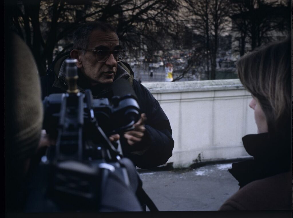 Krzysztof Kieślowski working on set.