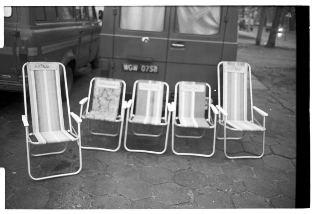 Portable chairs are prepared for crew members to rest.