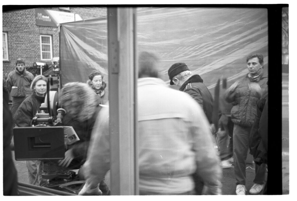The crew on the set at the telephone booth.