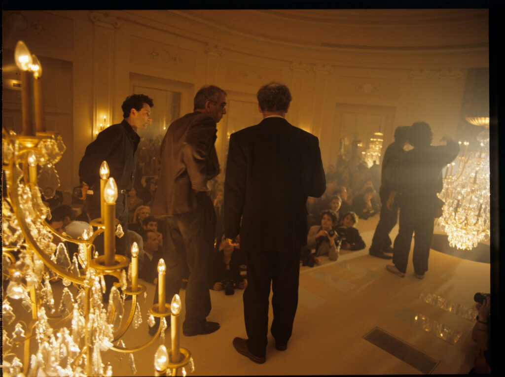 Filming a fashion show scene in a theater. Visible: Kieślowski (director), Gren (translator), Finkiel (assistant director).