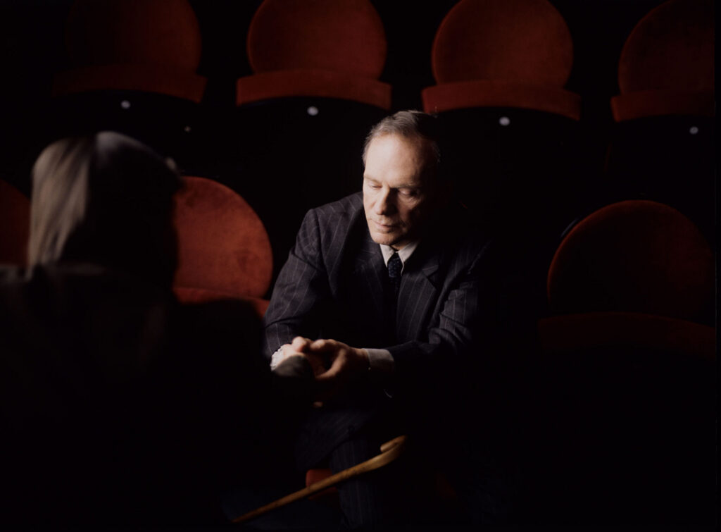 Retired judge Joseph Kern (Jean-Louis Trintignant) and Valentine (Irène Jacob) in the theater audience.