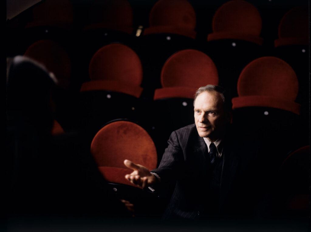 Retired judge Joseph Kern (Jean-Louis Trintignant) and Valentine (Irène Jacob) in the theater audience.