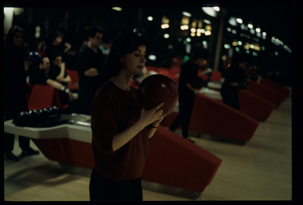 Valentine (Irène Jacob) at the bowling alley.