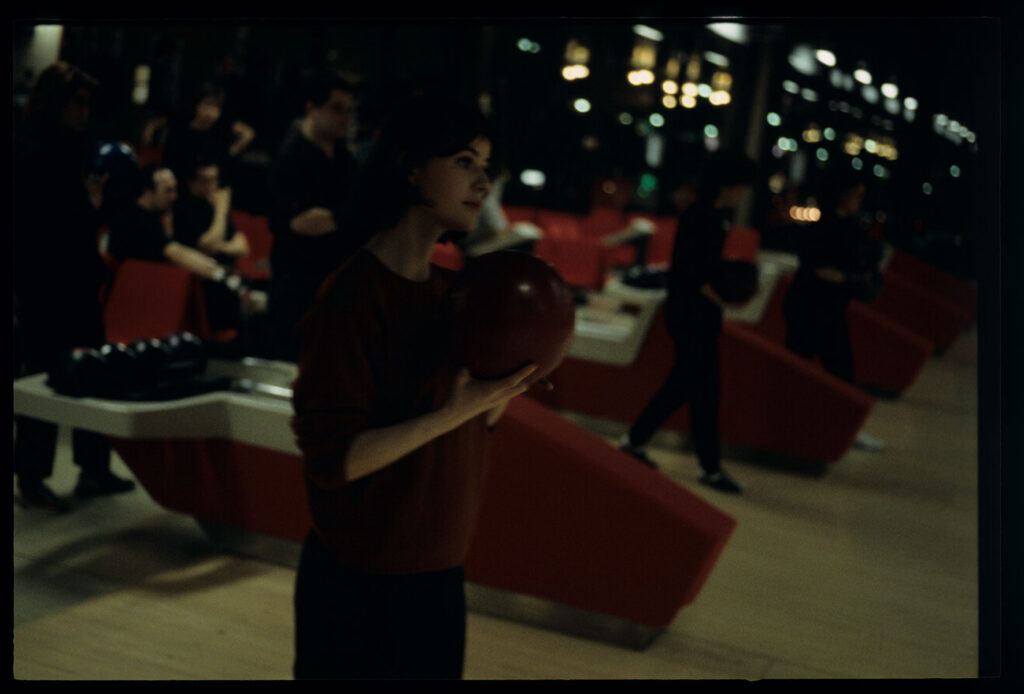 Valentine (Irène Jacob) at the bowling alley.
