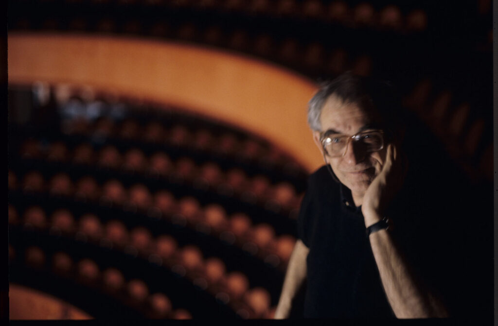 Kieślowski (director) in the audience of the theater where the fashion show with Valentine's participation took place.