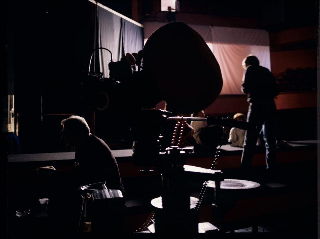 The crew while filming a scene in the theater audience.