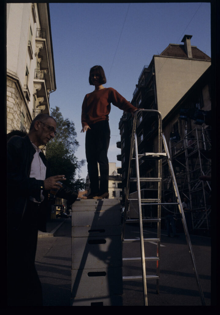 Irène Jacob (actress) and Krzysztof Kieślowski (director) during rehearsals for a photo session on a Geneva street.