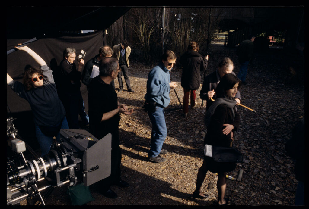 A film set in front of a judge's house. Part of the film crew is preparing to shoot a shot.