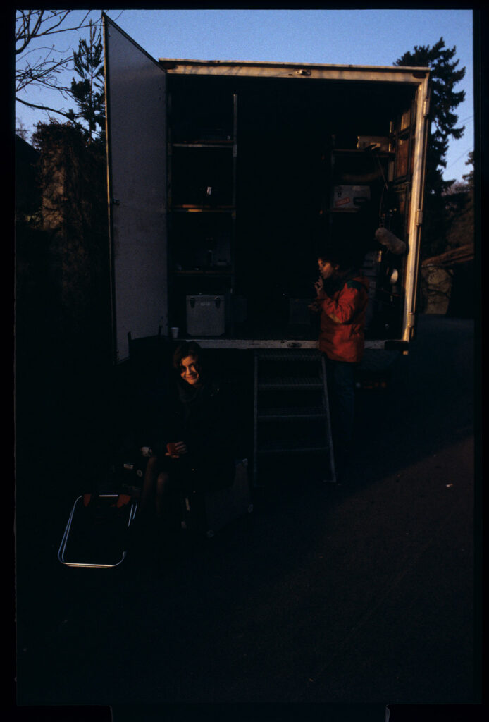 Irène Jacob waits on set for the next take.