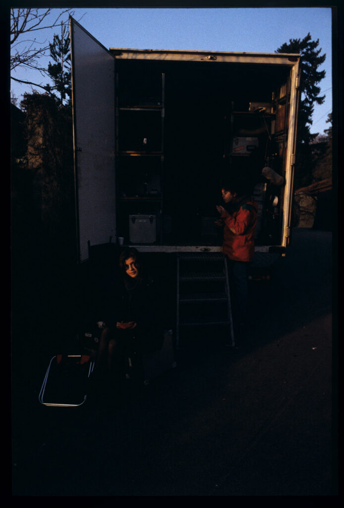 Irène Jacob waits on set for the next take.