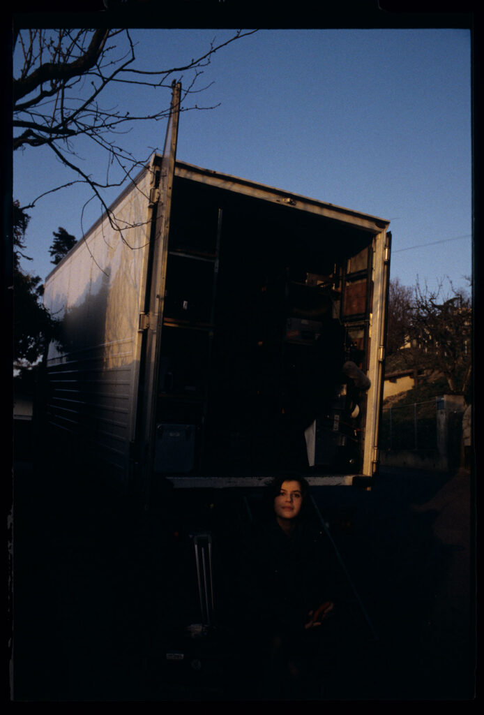 Irène Jacob waits on set for the next take.