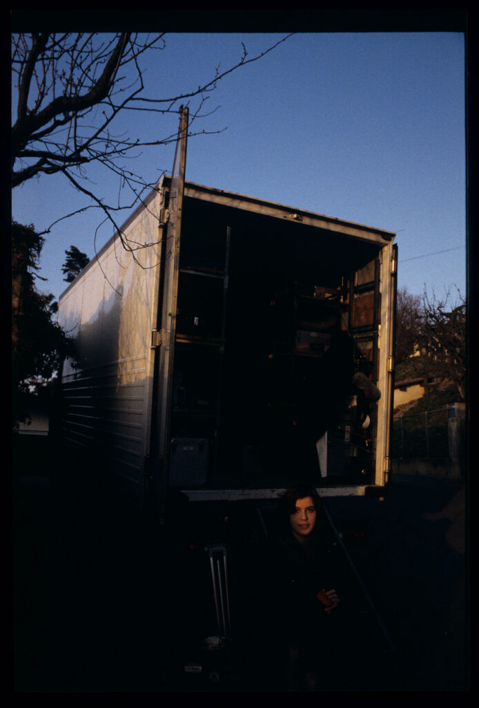 Irène Jacob waits on set for the next take.