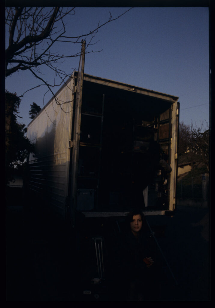 Irène Jacob waits on set for the next take.