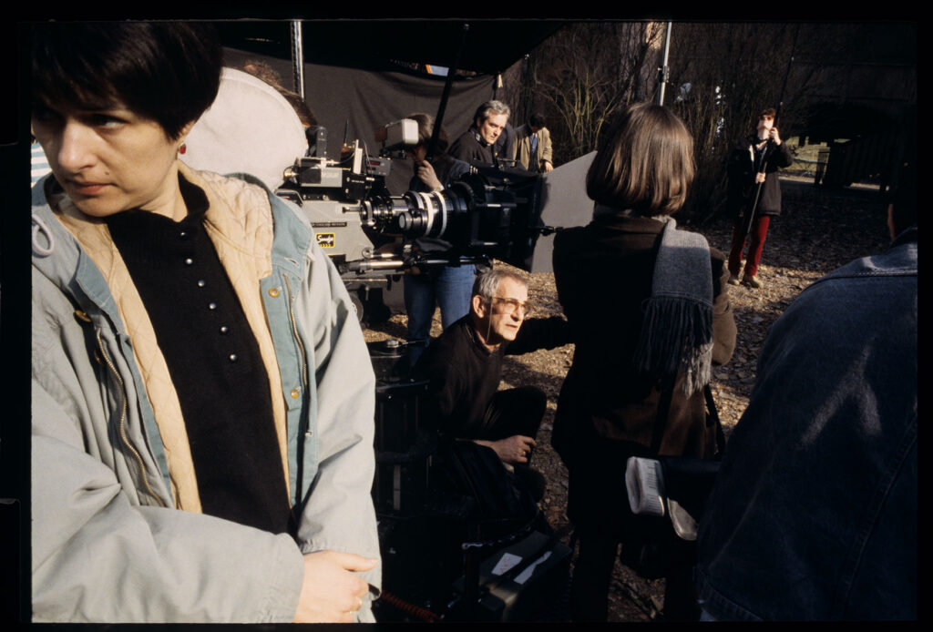 Kieślowski (director) gives instructions to Jacob (Valentine) during the filming of the scene in front of the judge's house.
