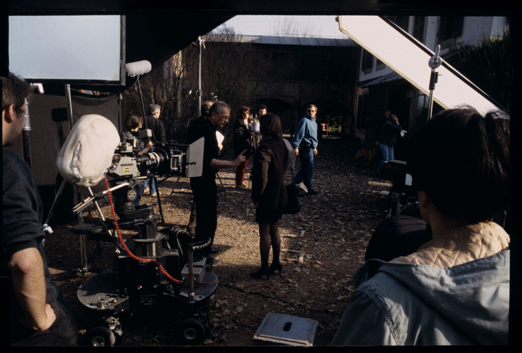 Kieślowski (director) gives instructions to Jacob (Valentine) during the filming of the scene in front of the judge's house.