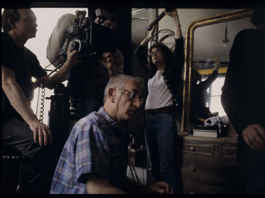 Irène Jacob (as Valentine) during the filming of the scene receiving a refund for the dog's treatment.