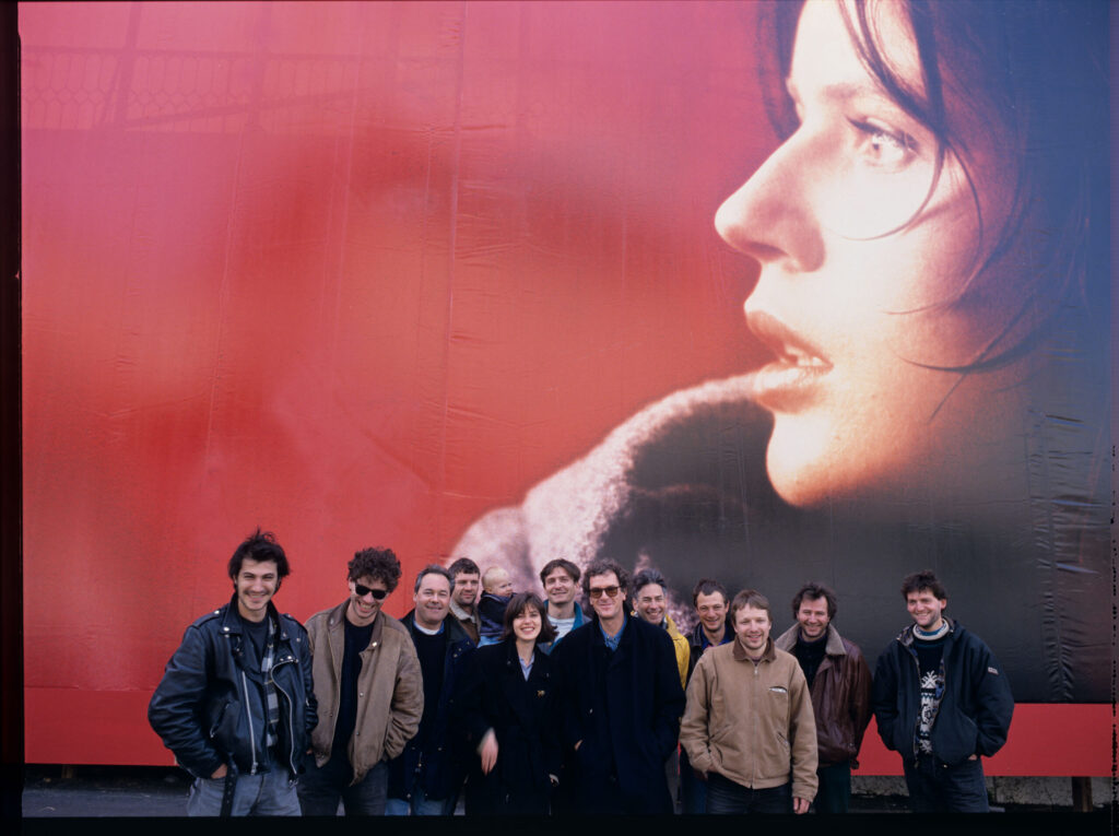 A souvenir photo of actress Jacob and stills photographer Jaxa in front of an advertising billboard with Valentine's image.