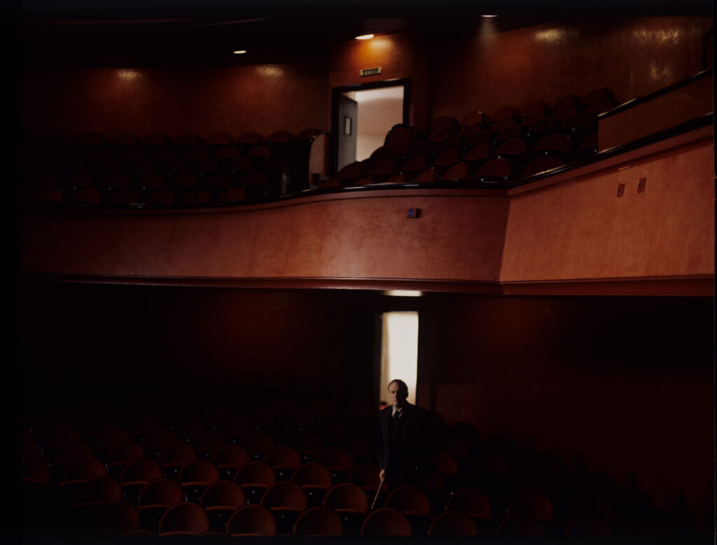 Retired judge Joseph Kern (Jean-Louis Trintignant) in the theater.