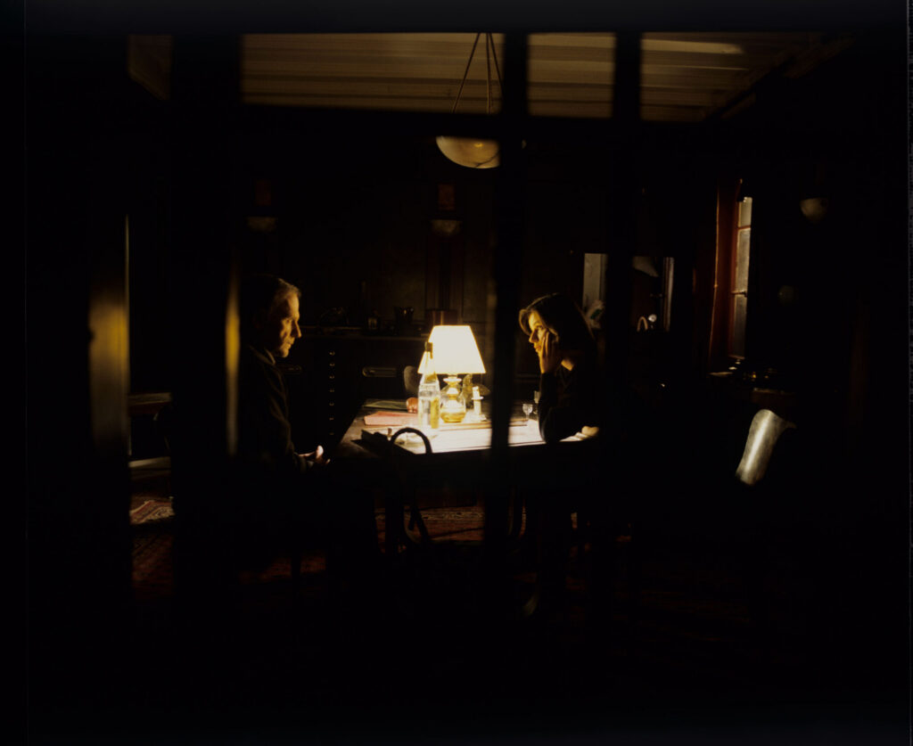 Retired judge Joseph Kern (Jean-Louis Trintignant) and Valentine (Irène Jacob) talk in the judge's apartment.