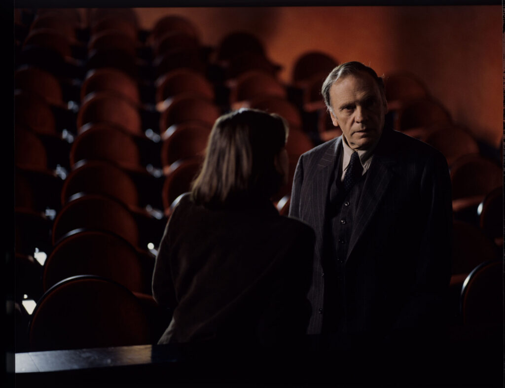 The main characters: judge Kern (Trintignant) and Valentine (Jacob) in the theater after Valentine's fashion show.