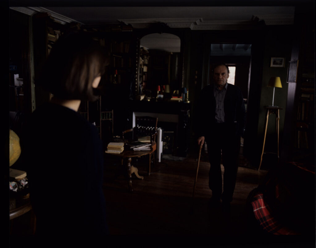 Retired judge Joseph Kern (Jean-Louis Trintignant) and Valentine (Irène Jacob) in the judge's apartment.