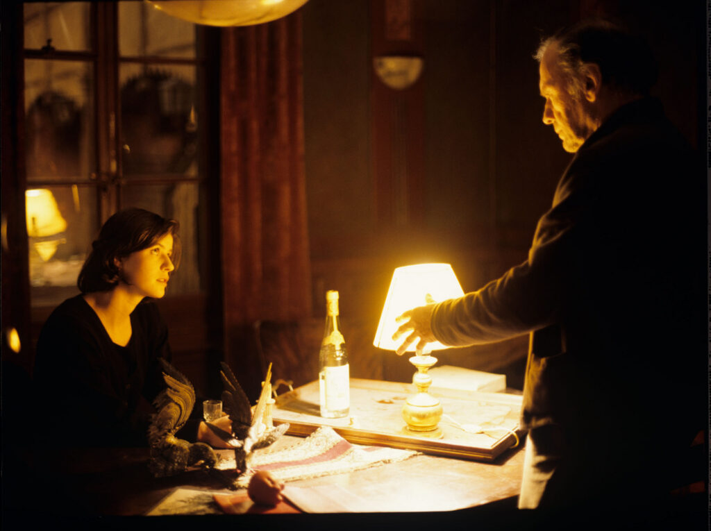 Retired judge Joseph Kern (Jean-Louis Trintignant) and Valentine (Irène Jacob) in the judge's apartment.