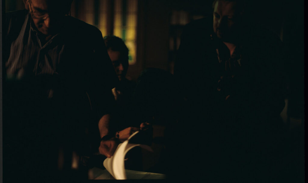 Kieślowski (director), Binoche (actress), Preisner (composer of music) on the set.