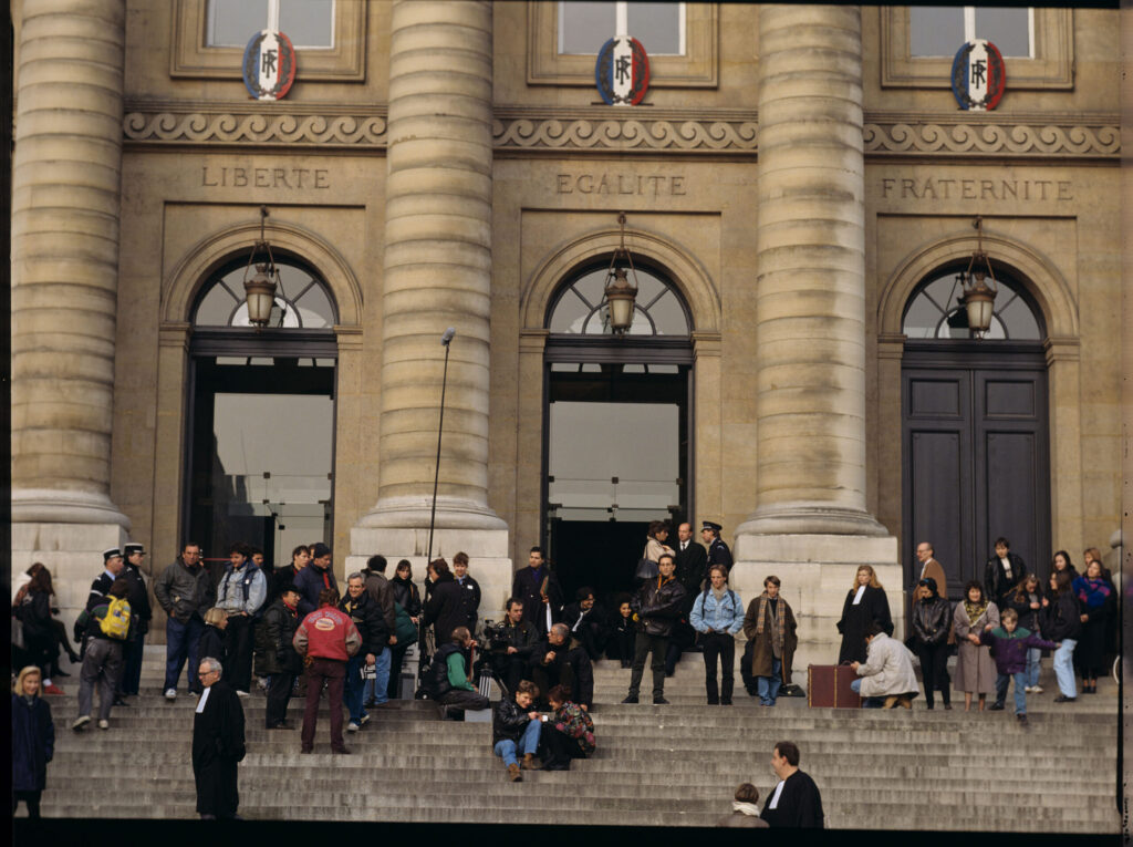 The crew on set on the steps of the Palace of Justice in Payz.