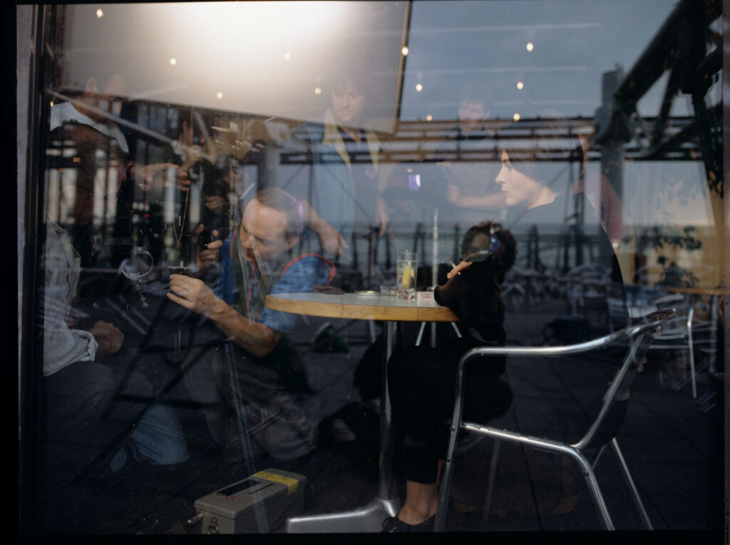 The crew during preparations for filming in a café where Julie meets the boy who witnessed the car accident.