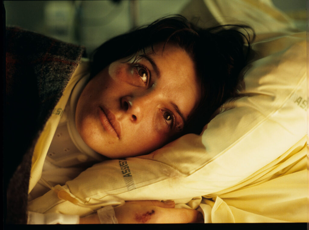 Julie (Juliette Binoche) in the hospital after the car accident, in which her husband and only daughter died