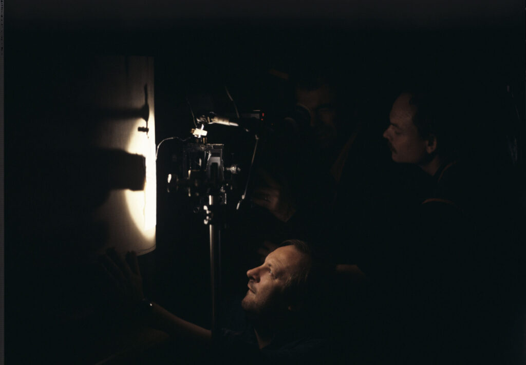 Preisner (composer of music), Idziak (cinematographer), Jedynak (photographer's assistant) while filming one of the scenes.